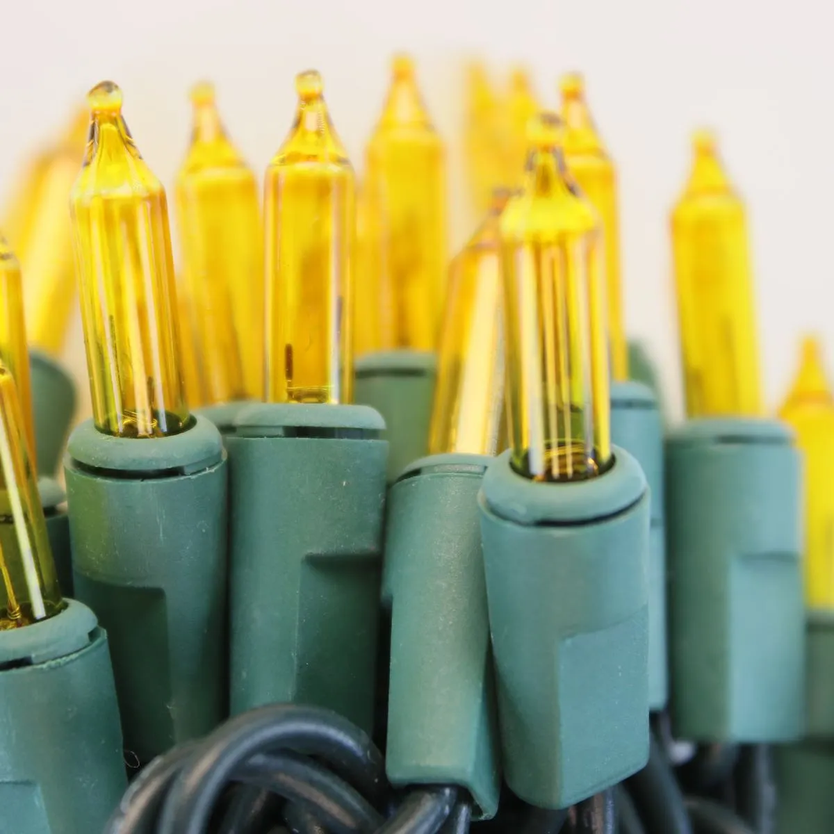 100-bulb Yellow Mini Lights, 6" Spacing, Green Wire