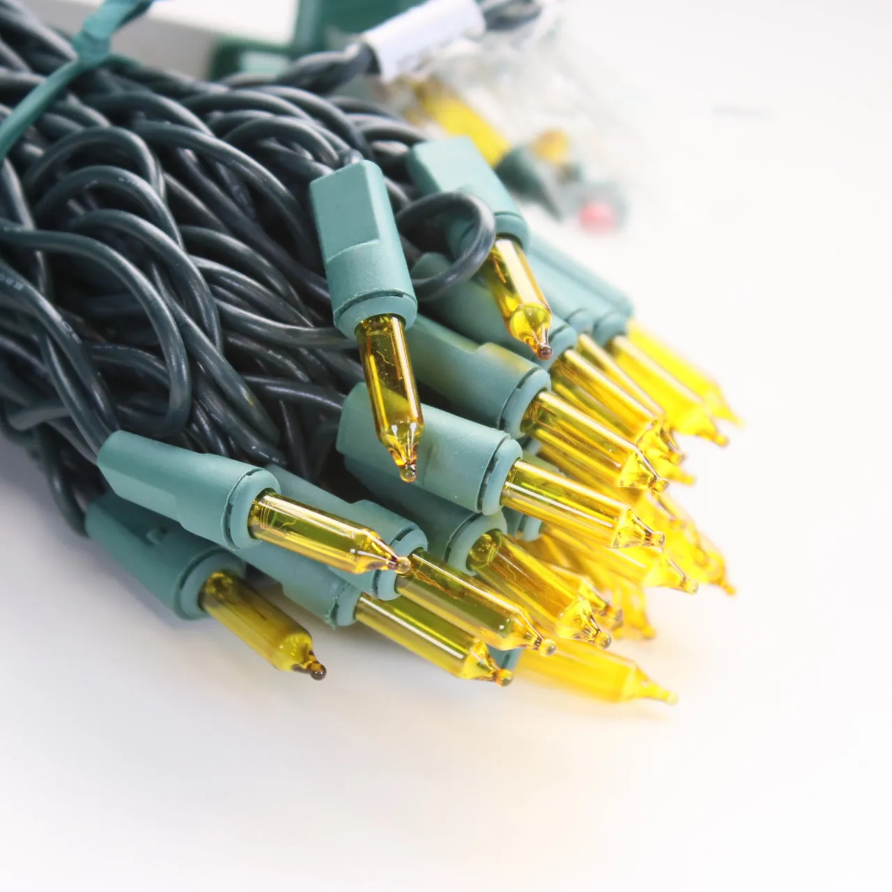 100-bulb Yellow Mini Lights, 6" Spacing, Green Wire