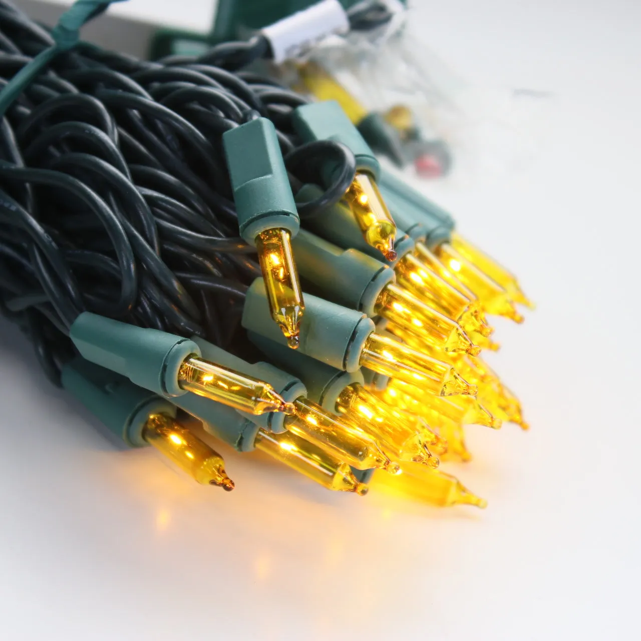 100-bulb Yellow Mini Lights, 6" Spacing, Green Wire