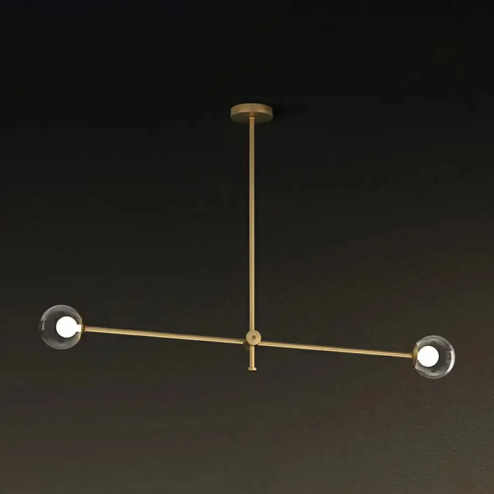 Minimalist Brass Finish Chandelier with Swivel Arm and Glass Shade