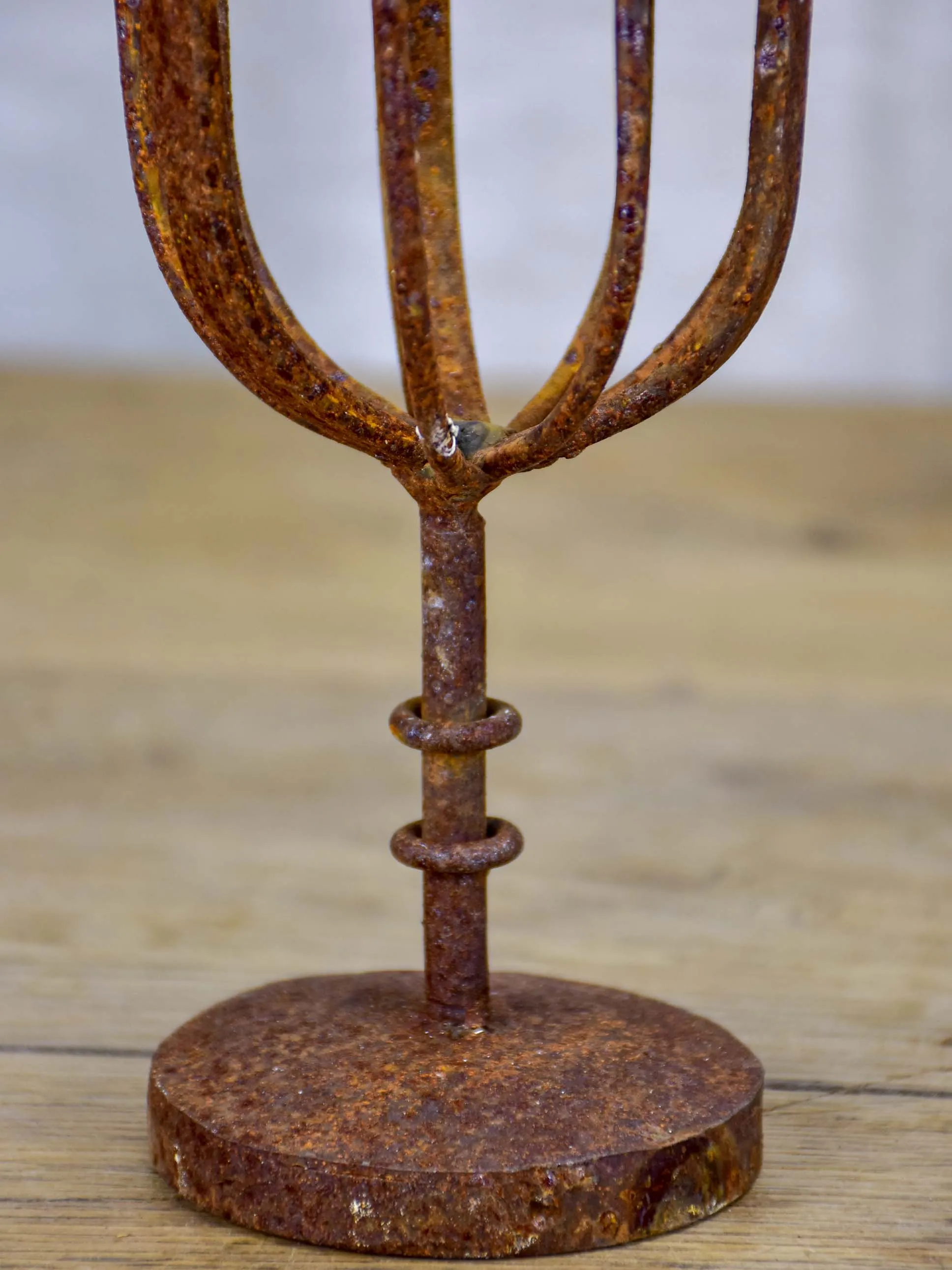 Pair of cup-shaped rustic candlesticks