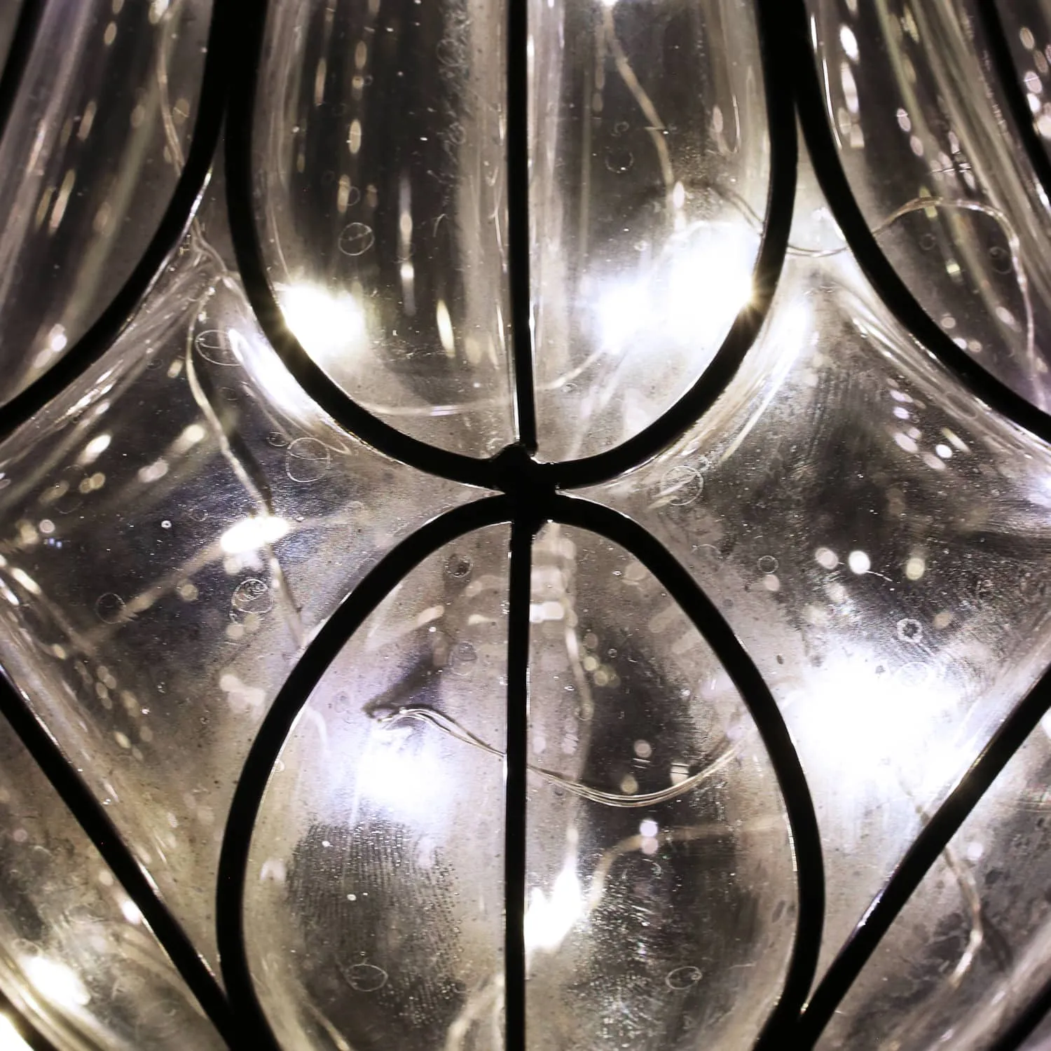 Solar Clear Glass Hanging Lantern with Looping Metal Pattern, 8 by 24 Inches